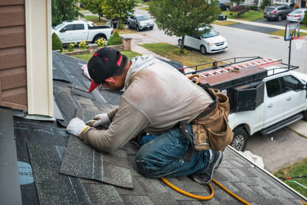 Professional Roofing technician working in Amityville, NY